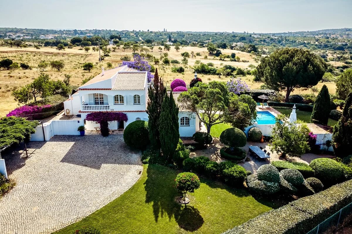 Aerial front view of Casa da Parra with manicured gardens, Guia, Algarve